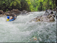 Kid Tubing In The Rapids Of The Blue River Rincon De La Vieja
 - Costa Rica