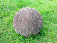 costa rica stone sphere on the grass at finca 
 - Costa Rica