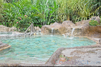 Los Lagos Hot Springs Cement Pool With Small Waterfall
 - Costa Rica